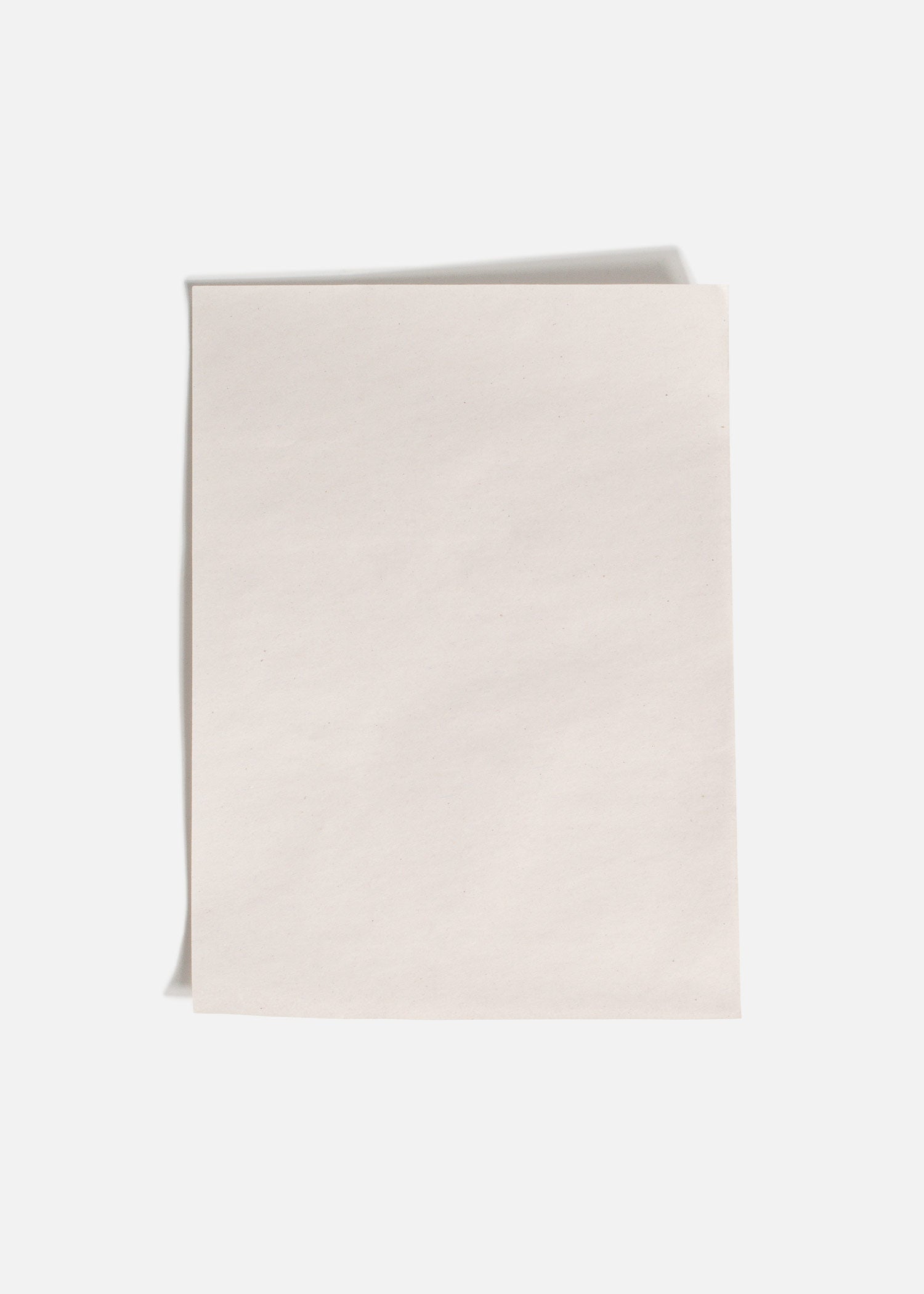 Papel encerado gris grado alimenticio para tacos 13.5x19 cm. Paquete de 5 kg