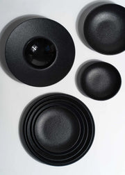 Platos trinche de porcelana negro Vantablack