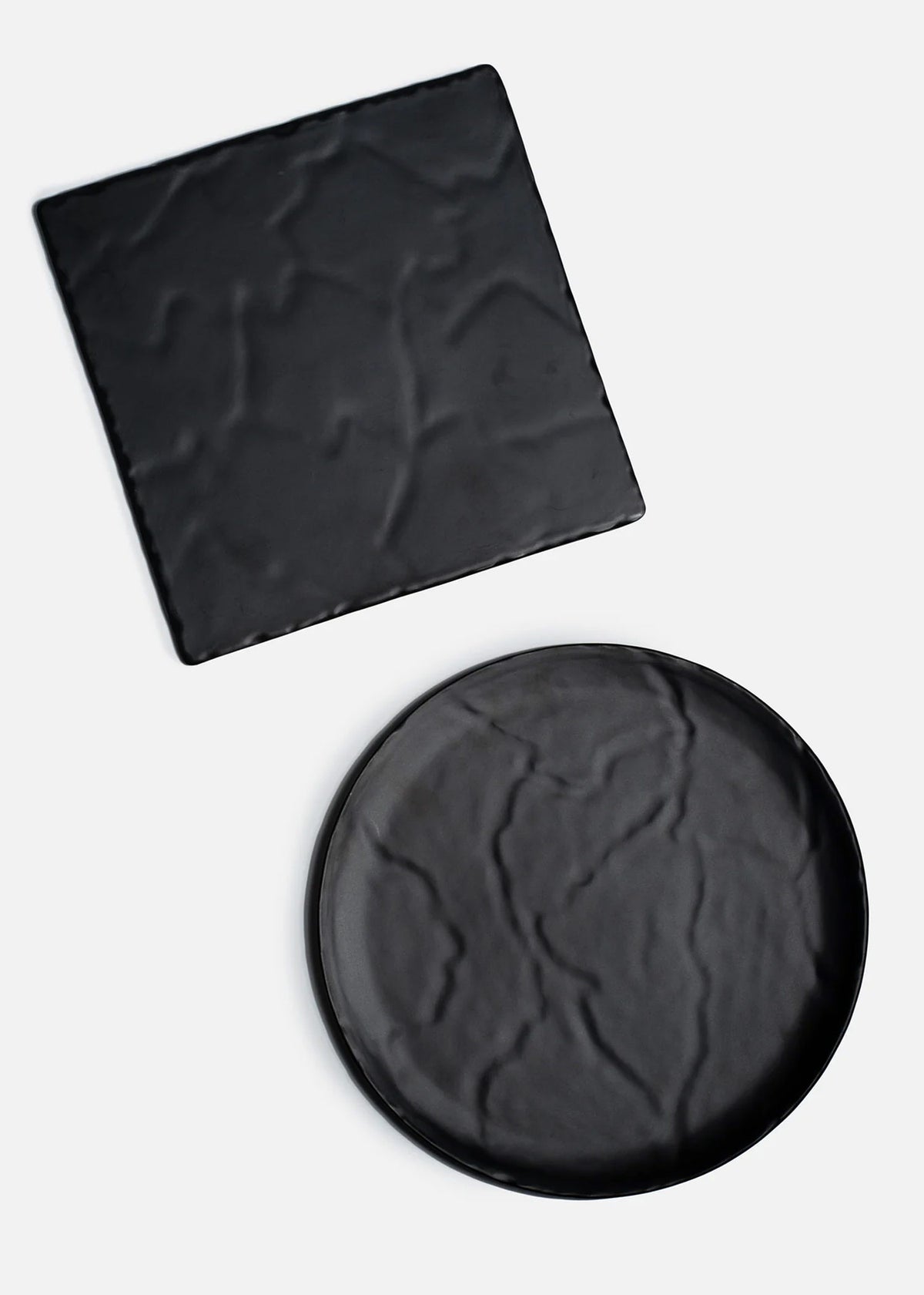 Platos negros de melamina Rivoli