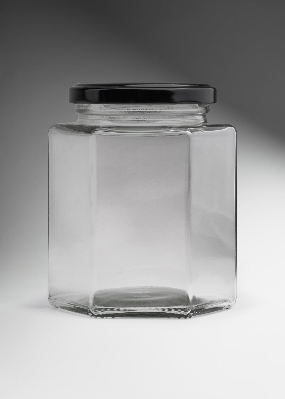 Frascos hexagonales de vidrio transparente con tapa negra uso alimenticio de 45 a 500 ml