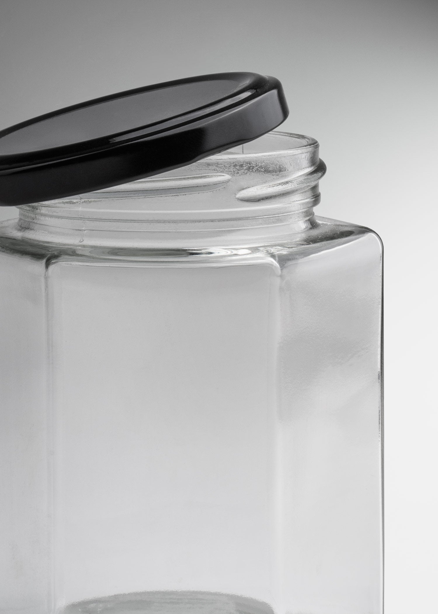 Frascos hexagonales de vidrio transparente con tapa negra uso alimenticio 380 y 500 ml
