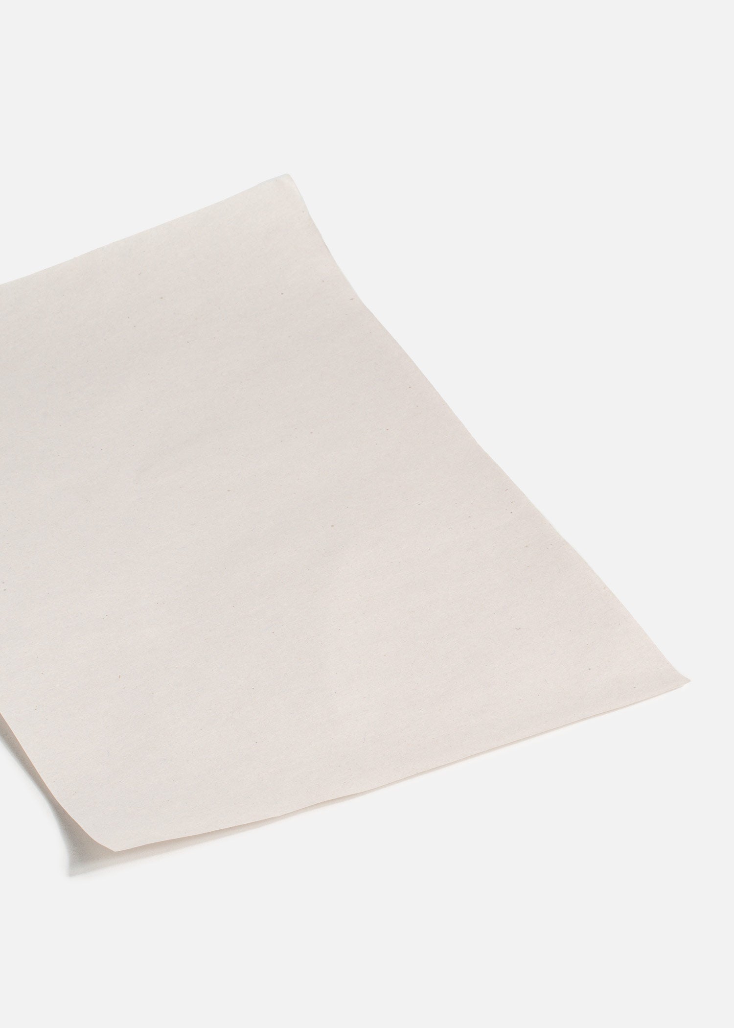 Papel encerado gris grado alimenticio para tacos 13.5x19 cm. Paquete de 5 kg