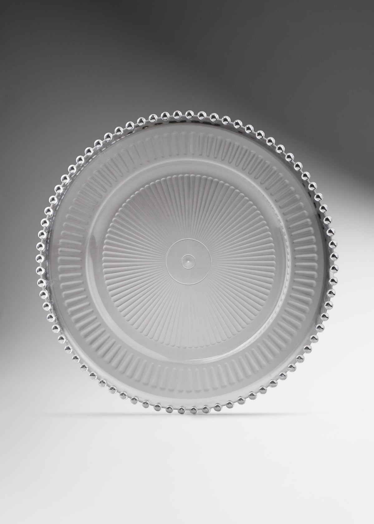 Plato base de vidrio transparente con filo plata Perla Ø 32 cm para banquetes, hoteles, restaurantes, bodas y eventos