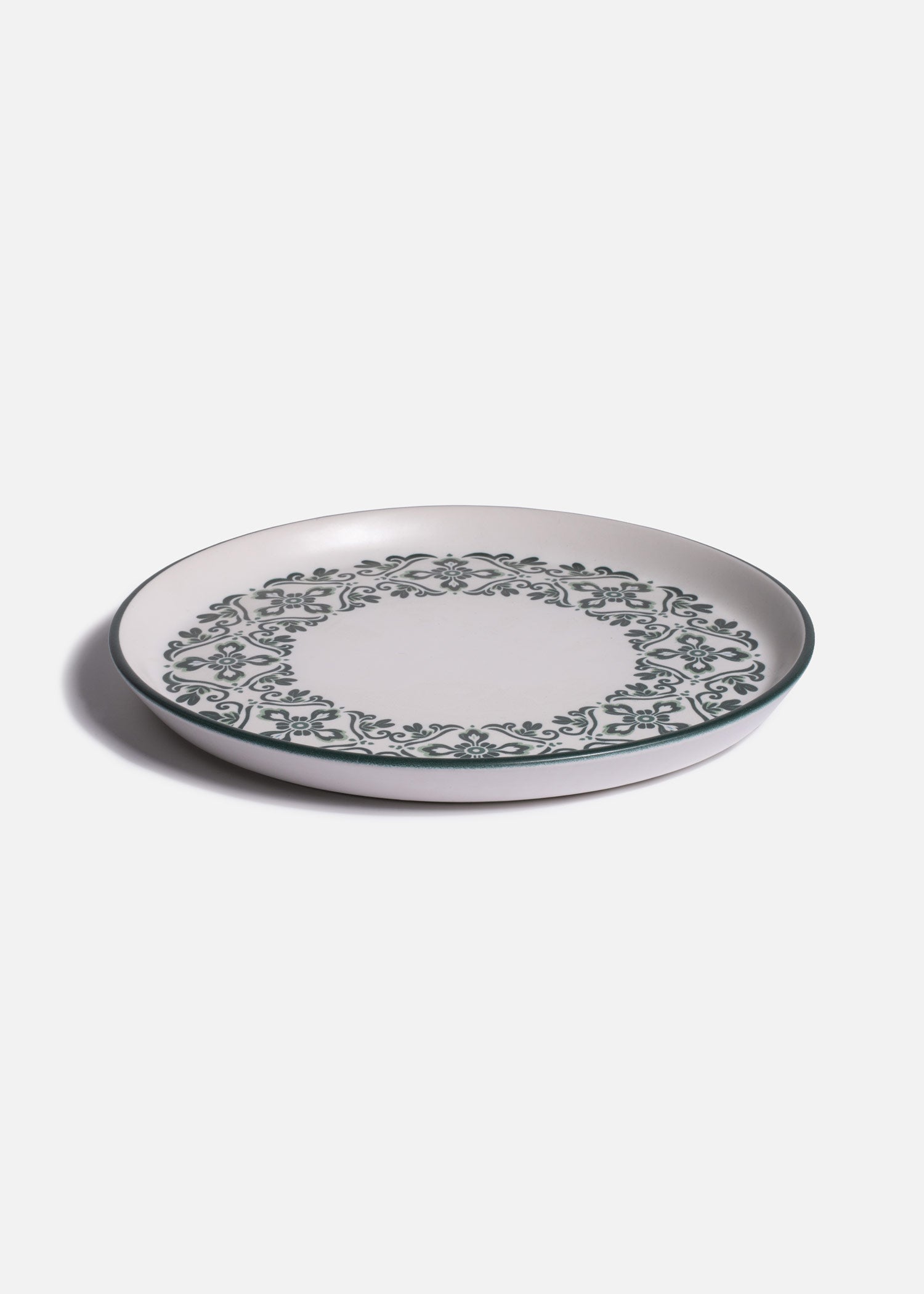 Plato de cerámica decorado con cenefa floral verde