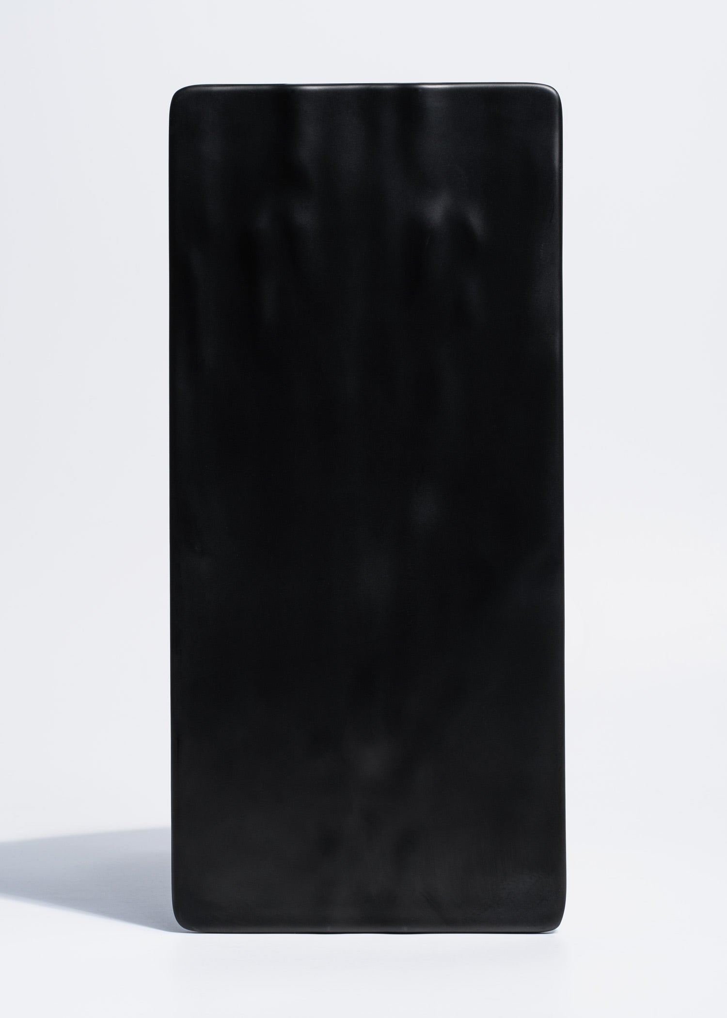 Plato rectangular negro de melamina Agni