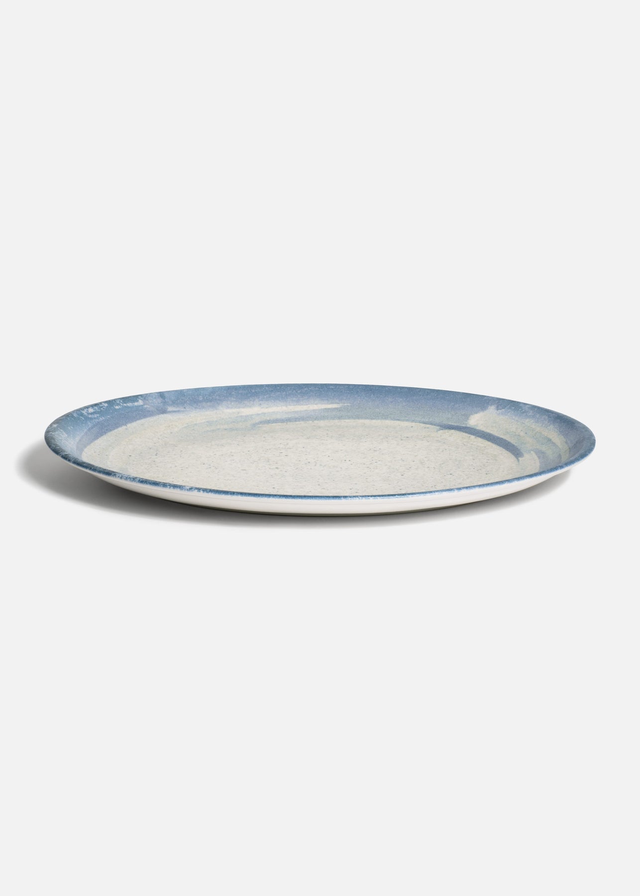 Plato de porcelana premium ovalado con acabado artesanal azul Harena