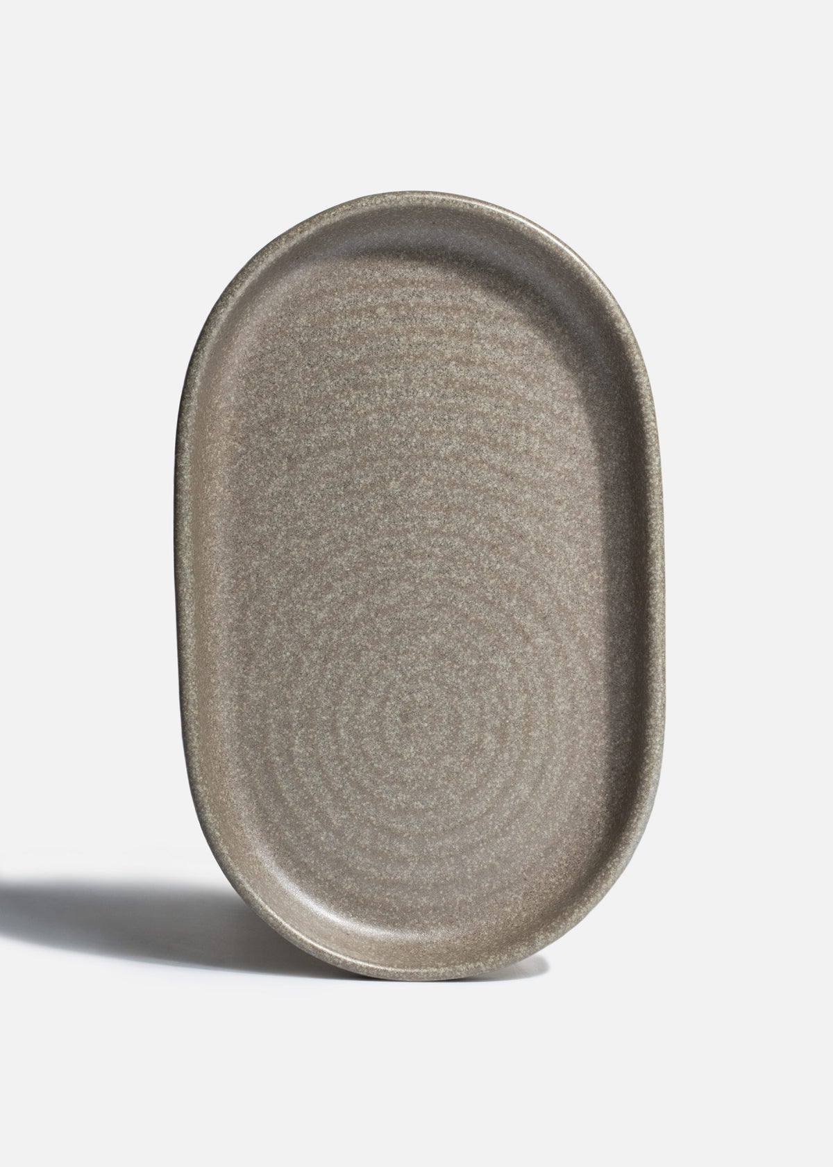 Vista superior del plato ovalado Adelfa Ripple