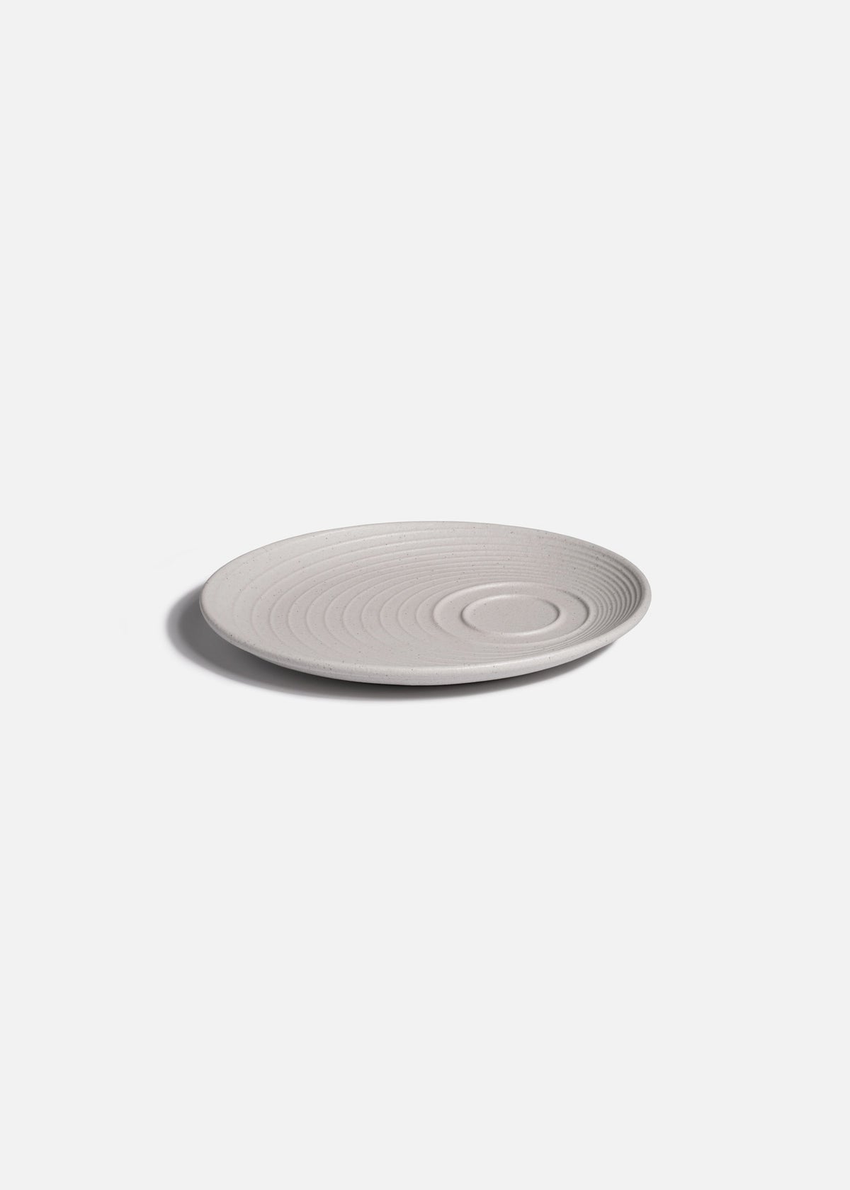 Detalle del efecto Ripple del platillo de porcelana marfil