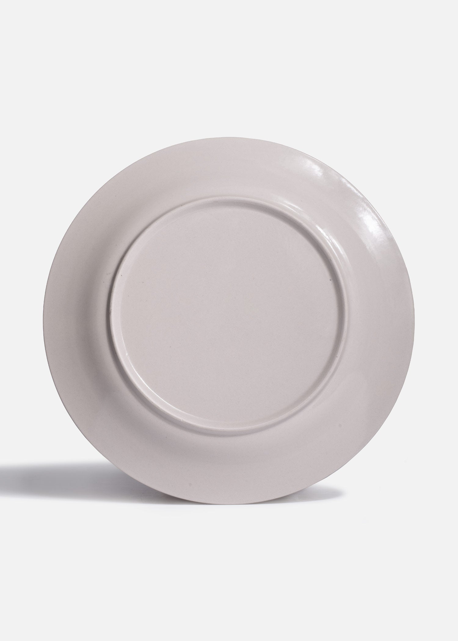 Detalle del diseño concéntrico del plato México Lindo amarillo