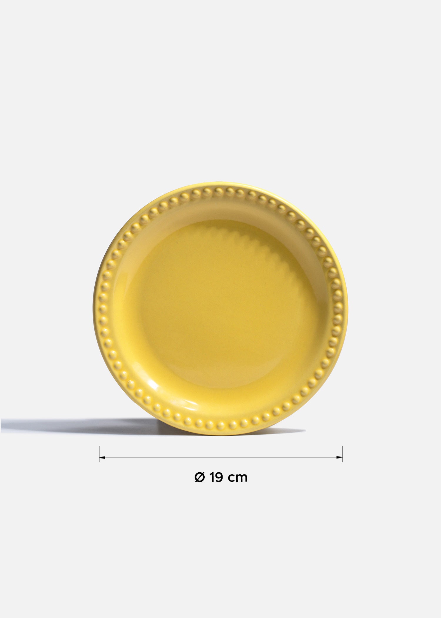 Plato Monet amarillo con borde decorativo tipo perla