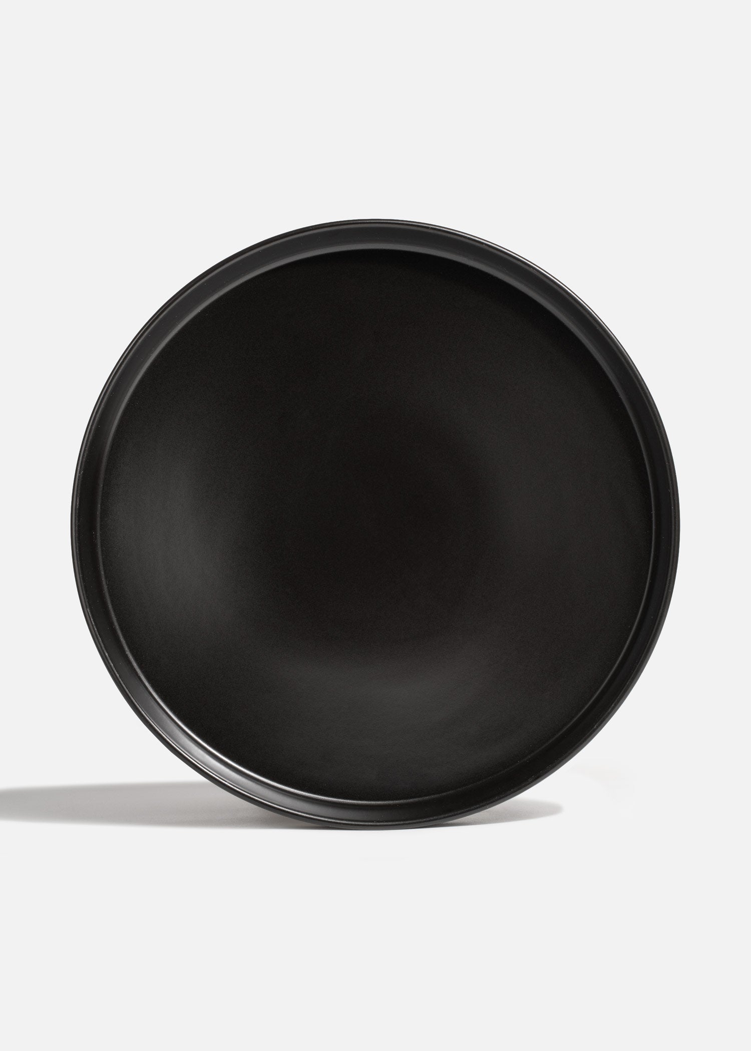 Plato trinche con borde elevado de cerámica premium negro esmalte mate profesional para restaurante y cafeterías Stone Lain Ø 27 cm