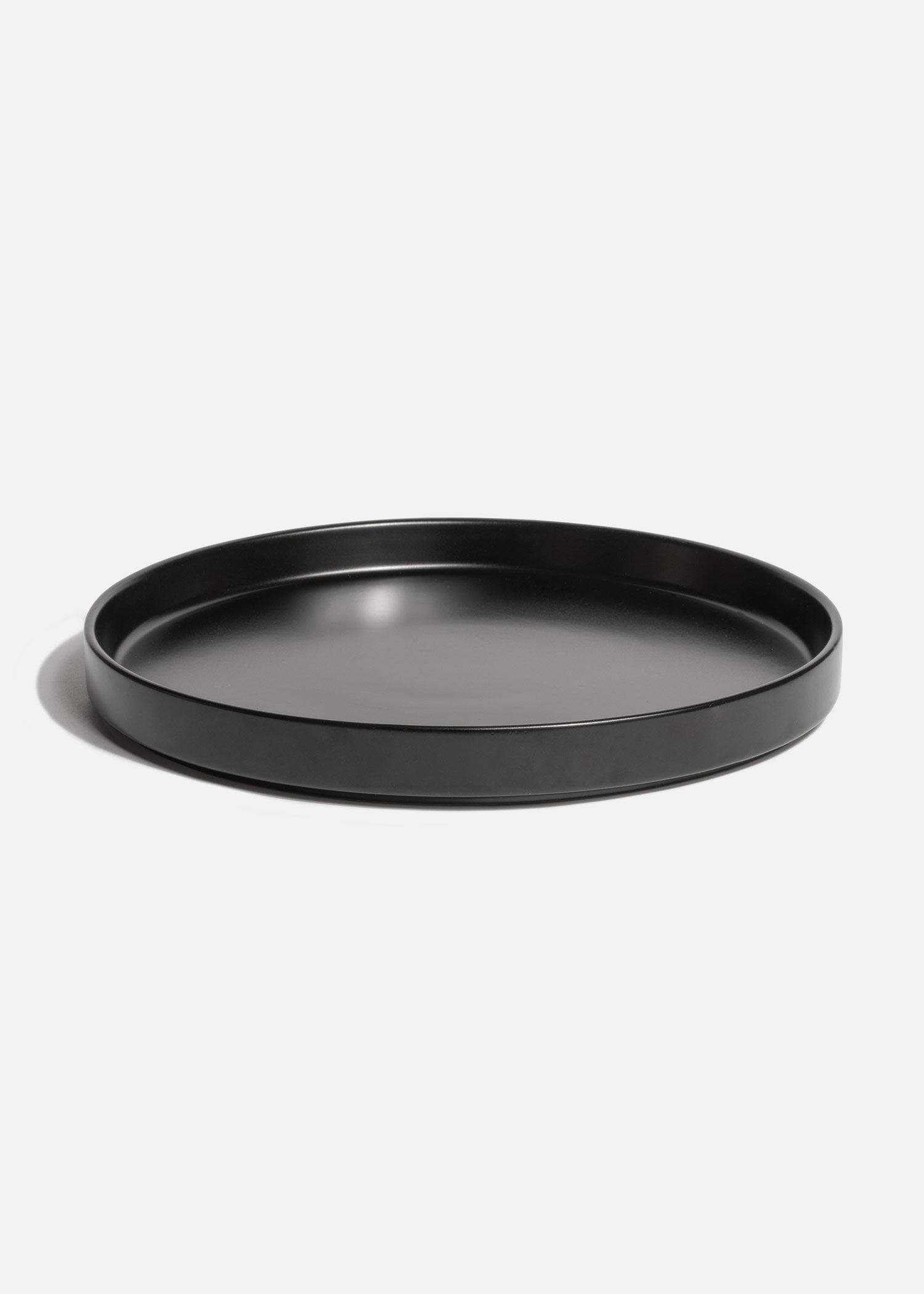 Plato trinche con borde elevado de cerámica premium negro esmalte mate profesional para restaurante y cafeterías Stone Lain Ø 27 cm