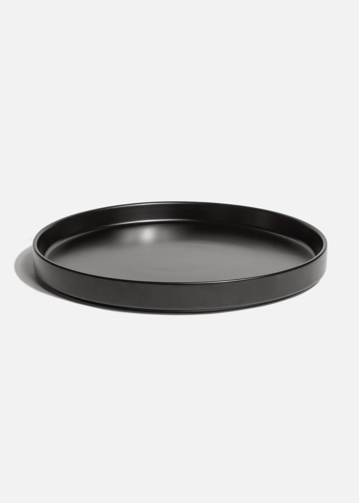 Plato trinche con borde elevado de cerámica premium negro esmalte mate profesional para restaurante y cafeterías Stone Lain Ø 27 cm