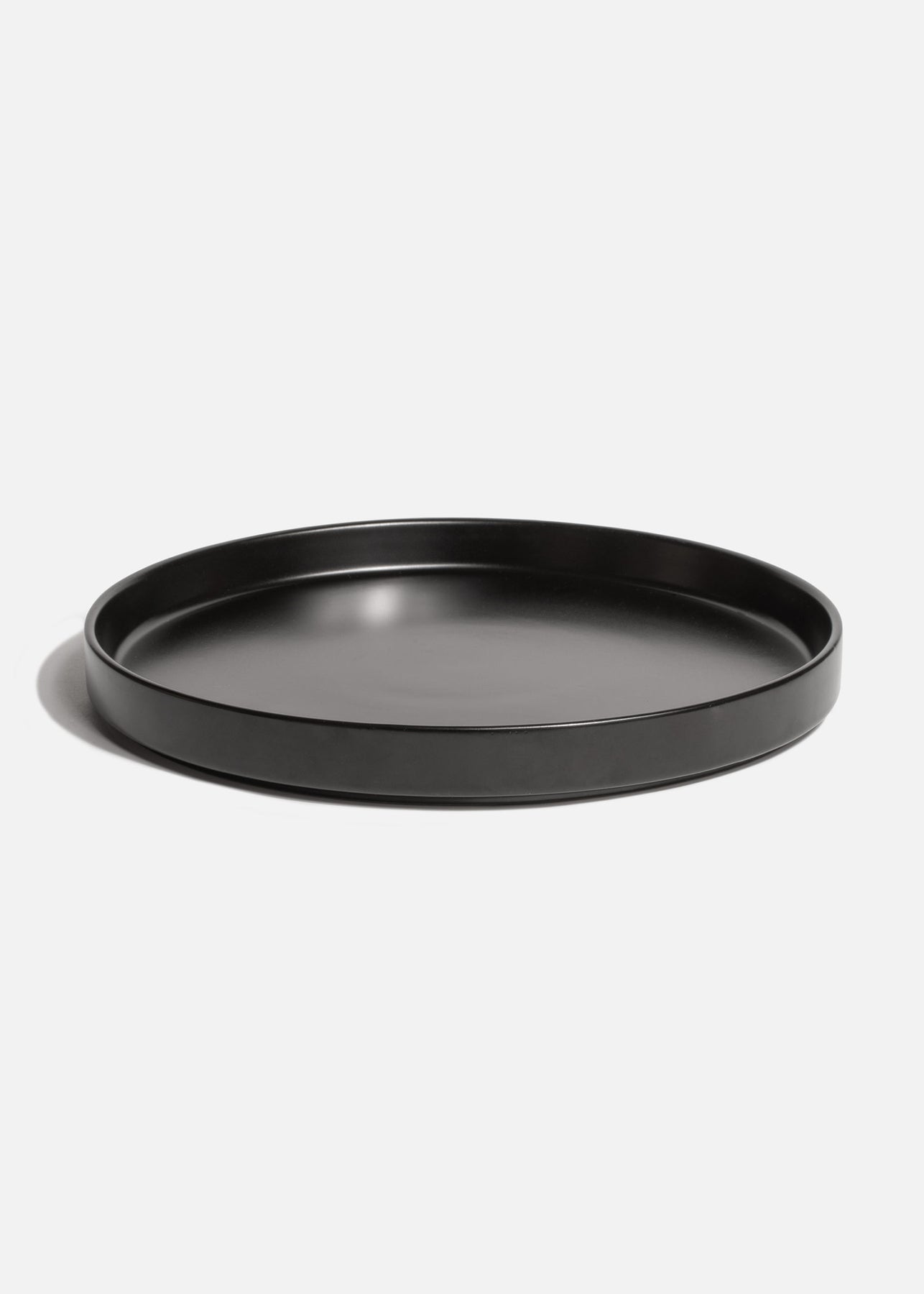 Plato trinche con borde elevado de cerámica premium negro esmalte mate profesional para restaurante y cafeterías Stone Lain Ø 27 cm