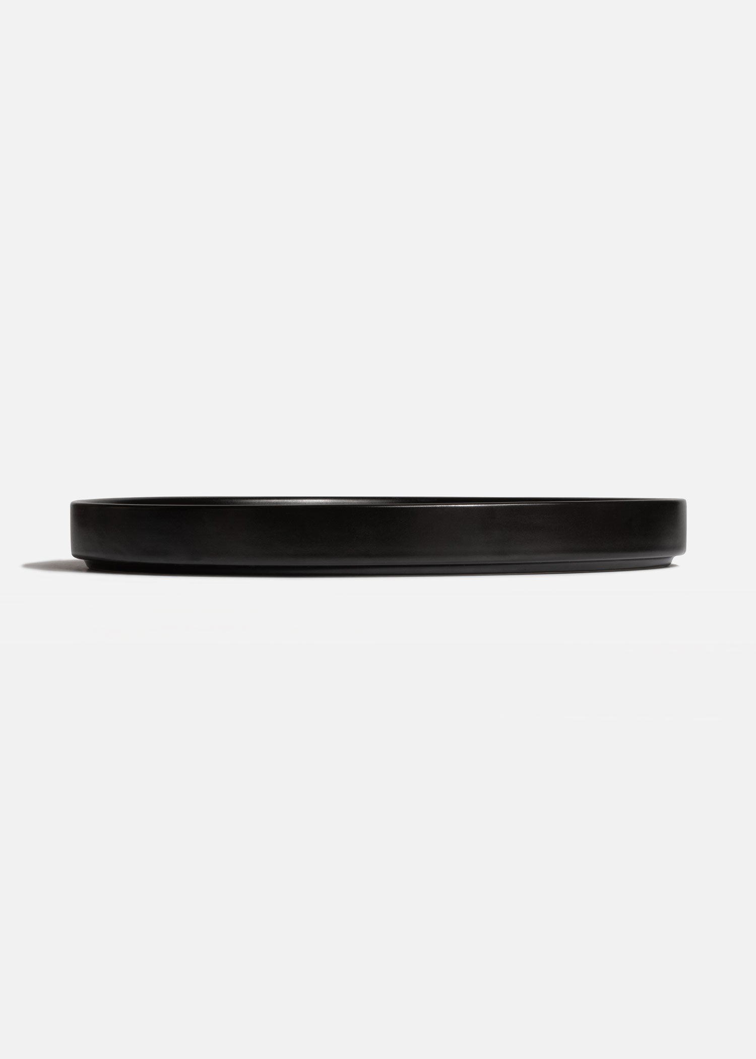 Plato trinche con borde elevado de cerámica premium negro esmalte mate profesional para restaurante y cafeterías Stone Lain Ø 27 cm