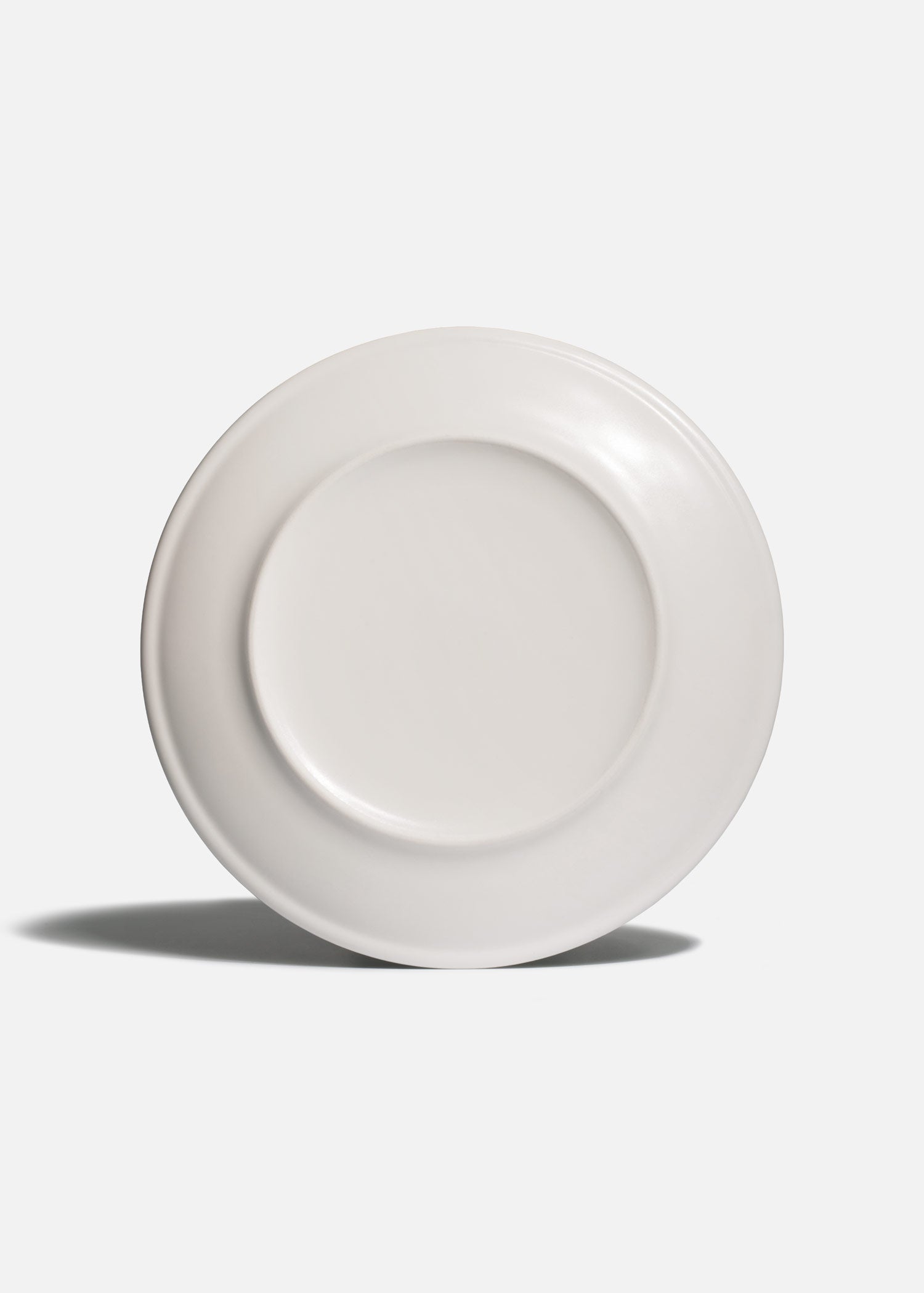 Plato Harena de porcelana premium con acabado moteado azul