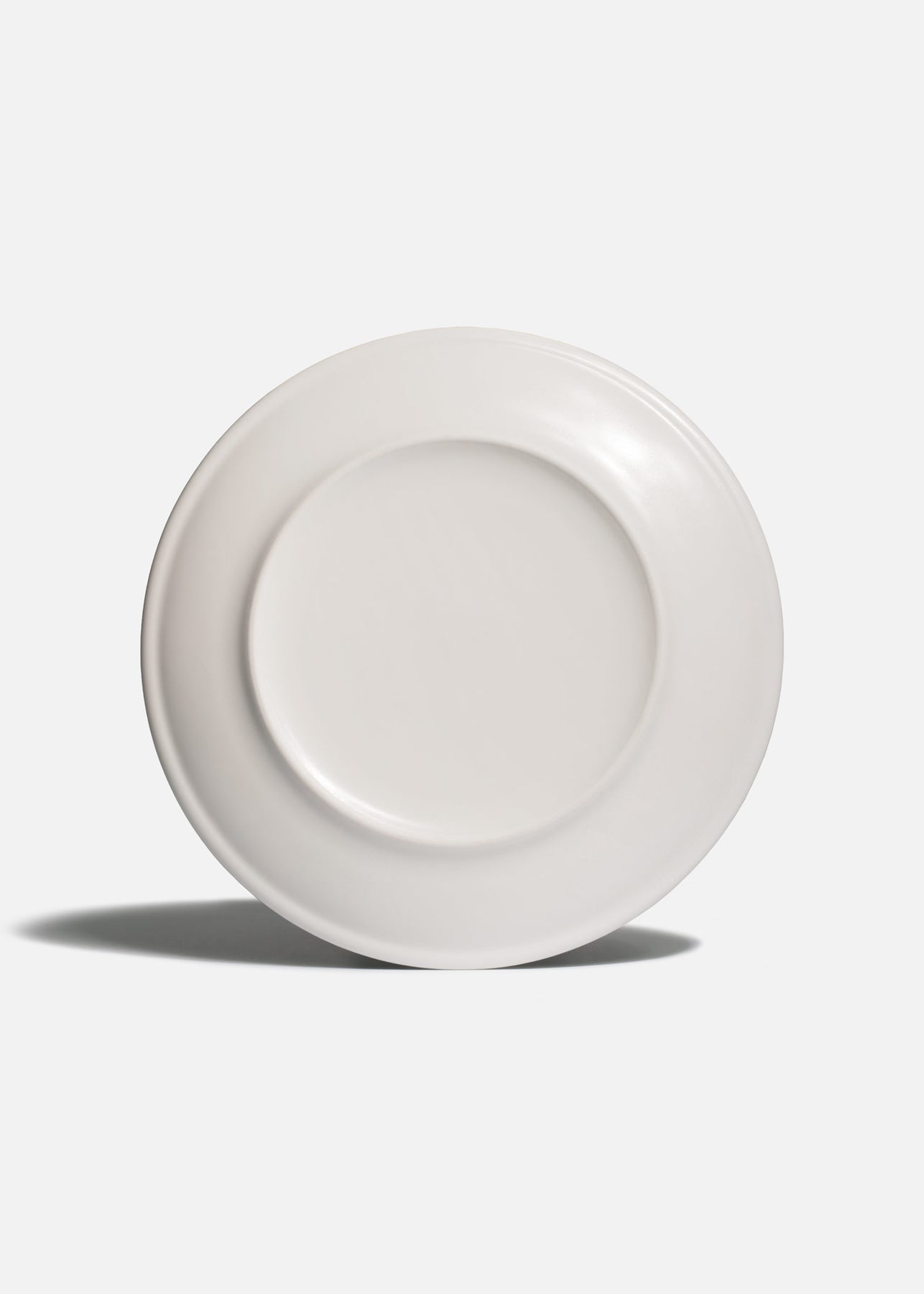 Plato Harena de porcelana premium con acabado moteado azul