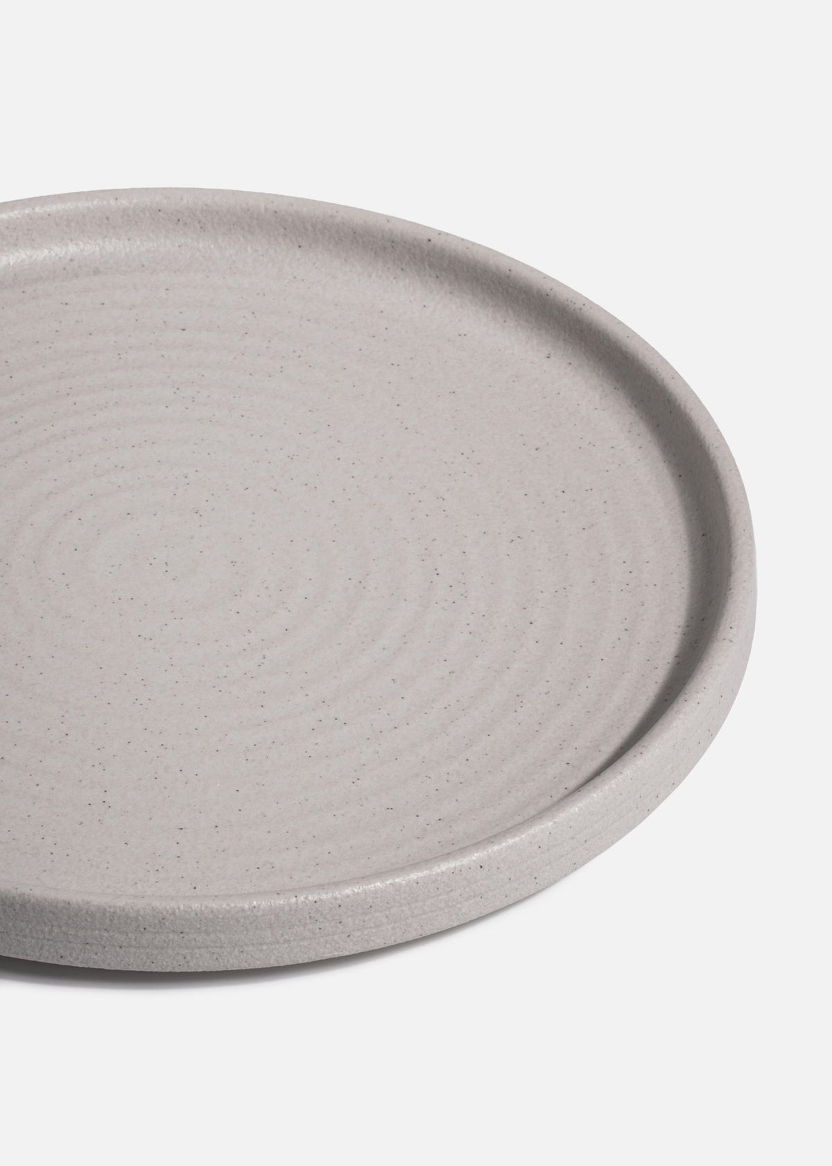 Detalle del acabado marfil moteado Liora Ripple