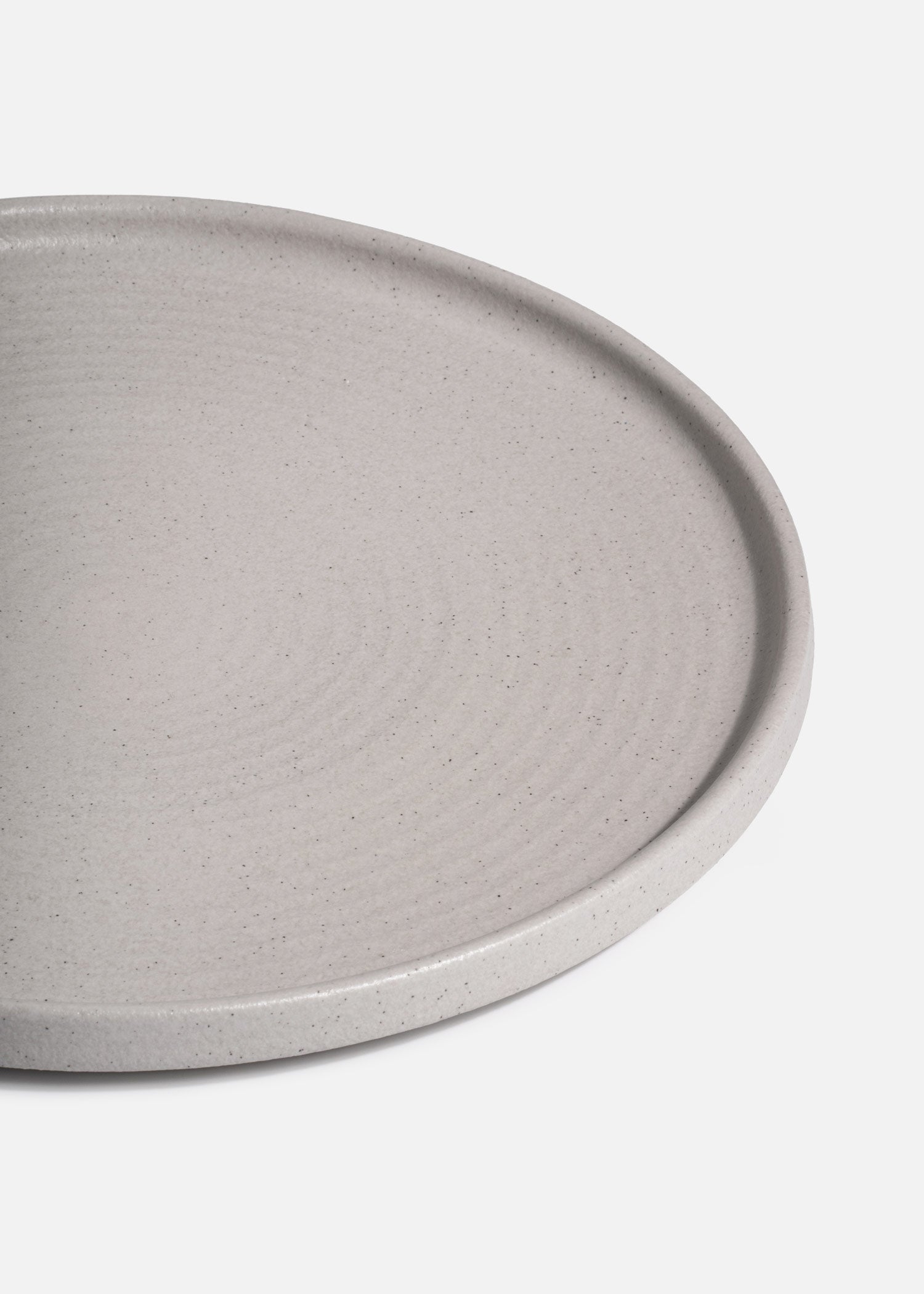 Detalle del acabado marfil moteado Liora Ripple