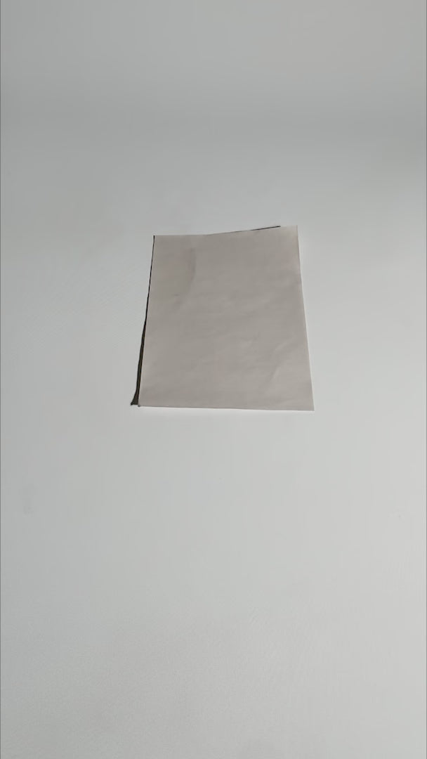 Cargar vídeo: Papel encerado gris grado alimenticio para tacos 13.5x19 cm. Paquete de 5 kg