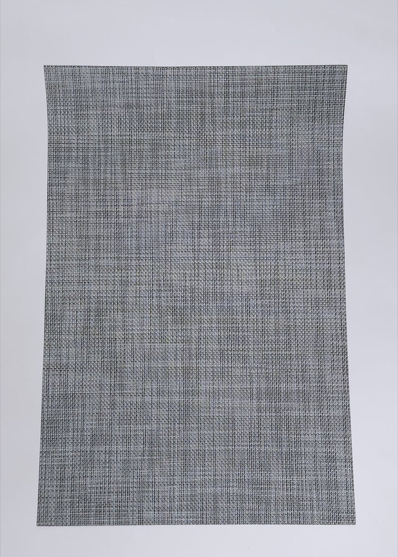 Video de estudio del mantel individual de poliéster y textileno gris jaspeado de 45 x 30 cm.