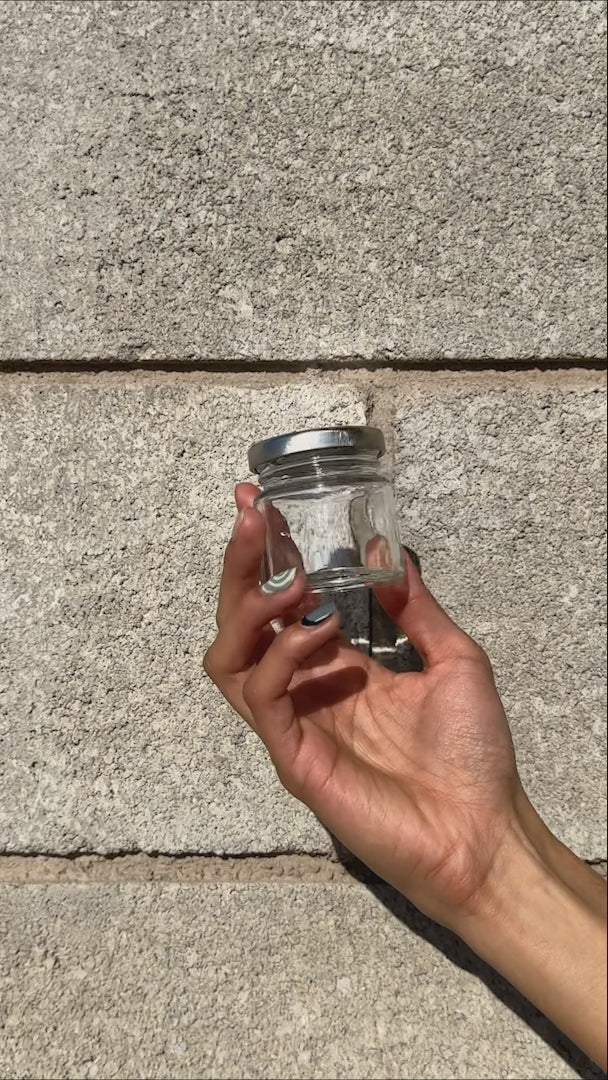 video detalles frasco de vidrio maha