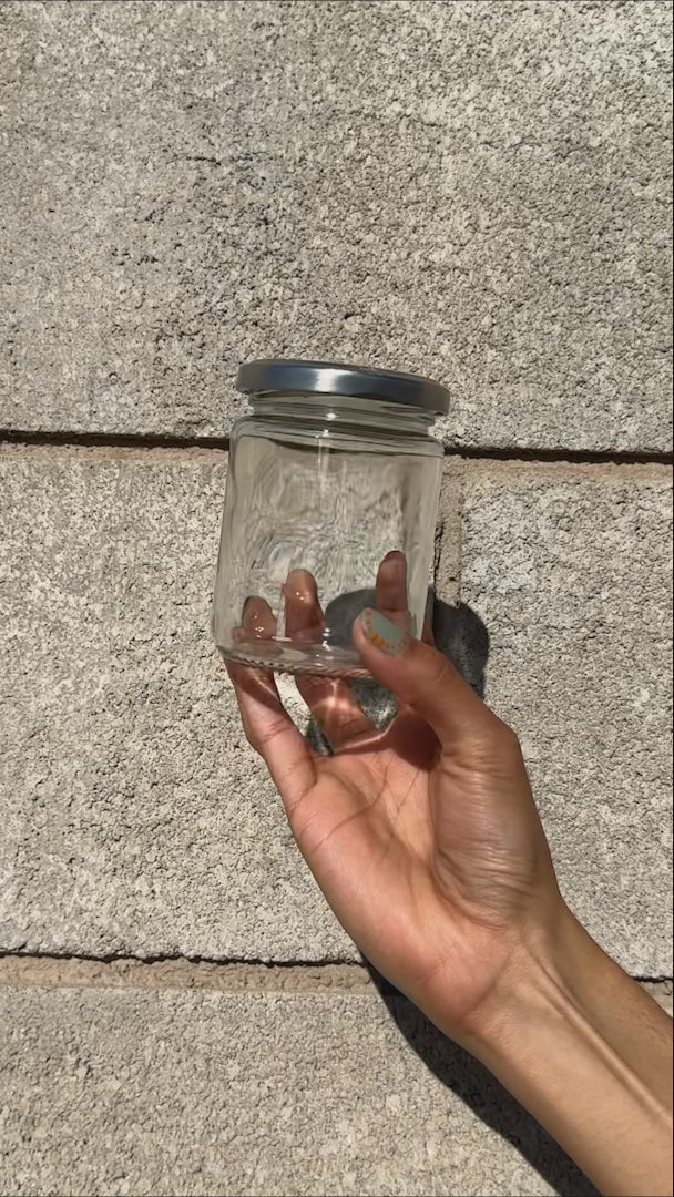 video detalles frasco de vidrio maha