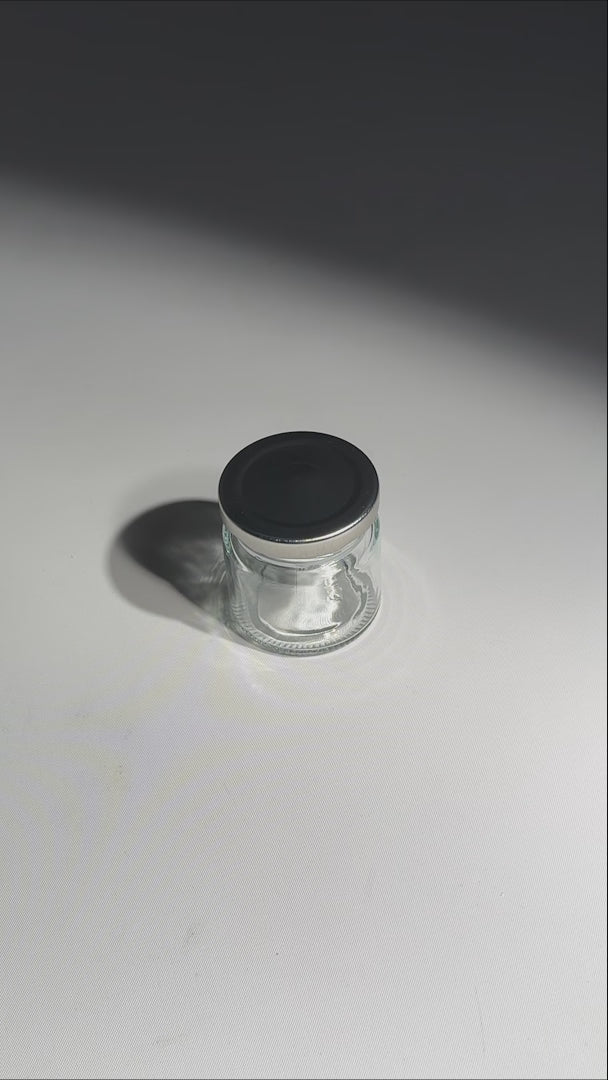 video detalles frasco de vidrio maha