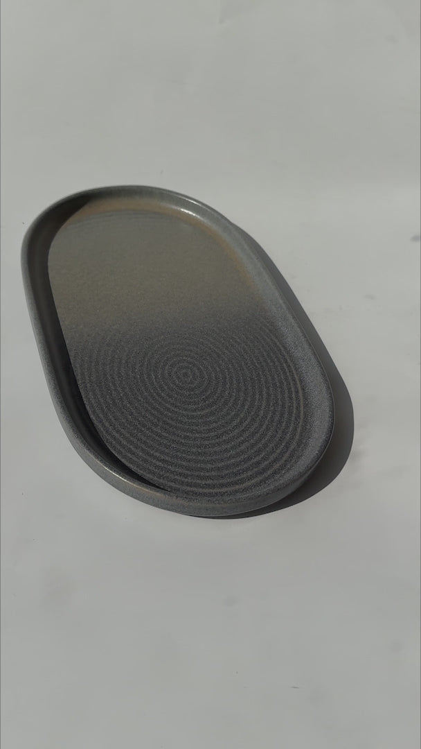 Video del acabado gris grafito y efecto Ripple del plato Hornfels